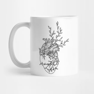 Black heart with creeping vines Mug